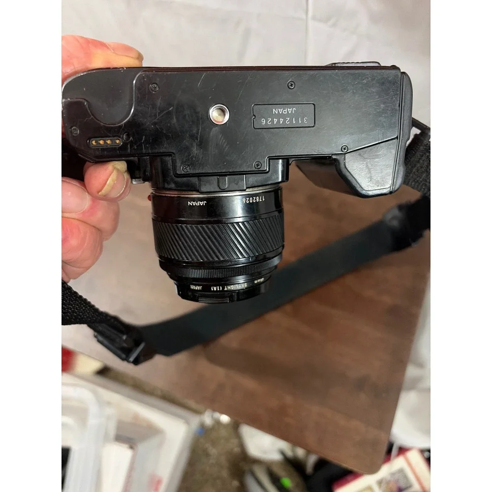 Minolta Maxxum 7000 AF 35mm SLR Camera with 50mm and Sigma 60-200mm Lense Manual